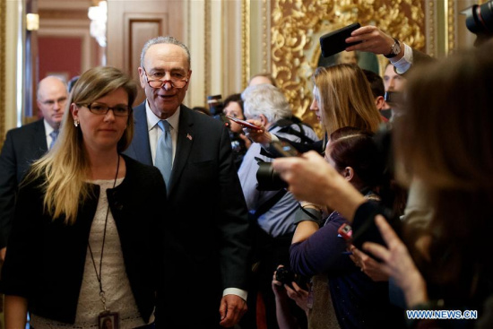 U.S. Senate Minority Leader Chuck Schumer (3rd L) heads to the Senate Chamber before a vote to end government shutdown on Capitol in Washington D.C., the United States, on Jan. 22, 2018. (Xinhua/Ting Shen) U.S. Senate Minority Leader Chuck Schumer (3rd L) heads to the Senate Chamber before a vote to end government shutdown on Capitol in Washington D.C., the United States, on Jan. 22, 2018. (Xinhua/Ting Shen)