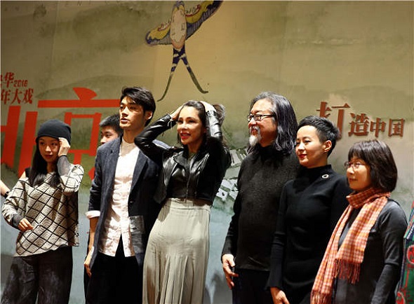 Director Lai (third from right) and the cast of Peking Man attend a promotional event in Beijing. (Photo by Zou Hong/China Daily)