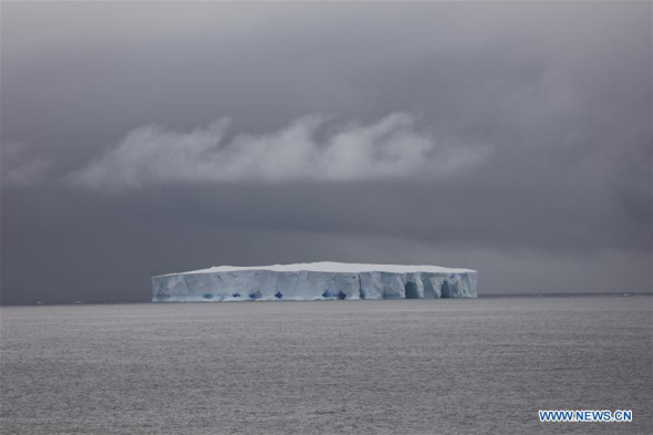 An iceberg is seen nearby China's research icebreaker Xuelong, or Snow Dragon, on its way to Zhongshan station in Antarctic, Dec 22, 2017. (Photo/Xinhua) An iceberg is seen nearby China's research icebreaker Xuelong, or Snow Dragon, on its way to Zhongshan station in Antarctic, Dec 22, 2017. (Photo/Xinhua)
