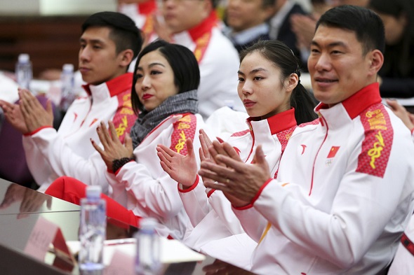 Figure skater Yu Xiaoyu (second from the right) applauds at the unveiling ceremony of the Chinese delegation to the 2018 Winter Olympic Games in Beijing, Jan 31, 2018. (Photo by Feng Yongbin/chinadaily.com.cn) Figure skater Yu Xiaoyu (second from the right) applauds at the unveiling ceremony of the Chinese delegation to the 2018 Winter Olympic Games in Beijing, Jan 31, 2018. (Photo by Feng Yongbin/chinadaily.com.cn)