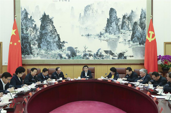 Wang Huning, a member of the Standing Committee of the Political Bureau of the Communist Party of China (CPC) Central Committee and head of the Central Commission for Guiding Cultural and Ethical Progress, presides over a plenary session of the commission, in Beijing, capital of China, Feb. 5, 2018. (Xinhua/Yao Dawei)