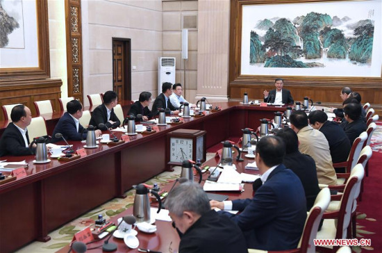 Chinese Vice Premier Wang Yang, also a member of the Standing Committee of the Political Bureau of the Communist Party of China Central Committee, attends a meeting held to solicit opinions from entrepreneurs of the private sector, in Beijing, capital of China, Feb. 9, 2018. 