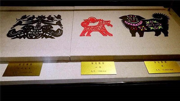 Dog-themed paper-cuttings are on display at the Heilongjiang Provincial Museum in Harbin, Heilongjiang province. (Photo provided to chinadaily.com.cn) Dog-themed paper-cuttings are on display at the Heilongjiang Provincial Museum in Harbin, Heilongjiang province. (Photo provided to chinadaily.com.cn)