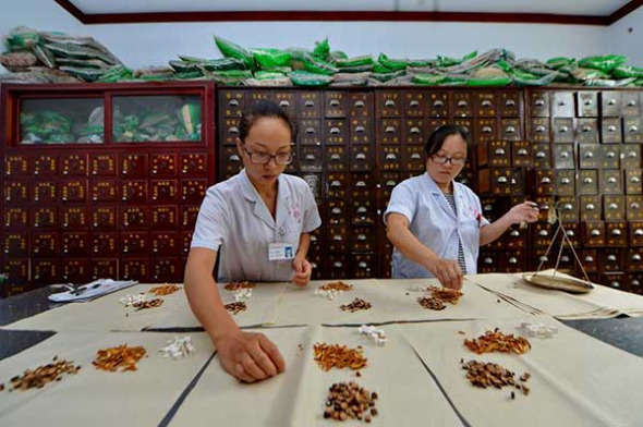 Built on more than 2,500 years of medical practice, the TCM contains various forms of treatment, including herbal medicine, acupuncture, massage, exercise and dietary therapy.(Photo/Xinhua) Built on more than 2,500 years of medical practice, the TCM contains various forms of treatment, including herbal medicine, acupuncture, massage, exercise and dietary therapy.(Photo/Xinhua)
