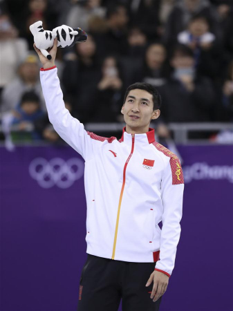 Wu Dajing of China celebrates during venue ceremony of men's 500m event of short track speed skating at the 2018 PyeongChang Winter Olympic Games at Gangneung Ice Arena, Gangneung, South Korea, Feb. 22, 2018. Wu Dajing claimed gold medal in a time of 0:39.584 and set new world record. (Xinhua/Han Yan) Wu Dajing of China celebrates during venue ceremony of men's 500m event of short track speed skating at the 2018 PyeongChang Winter Olympic Games at Gangneung Ice Arena, Gangneung, South Korea, Feb. 22, 2018. Wu Dajing claimed gold medal in a time of 0:39.584 and set new world record. (Xinhua/Han Yan)