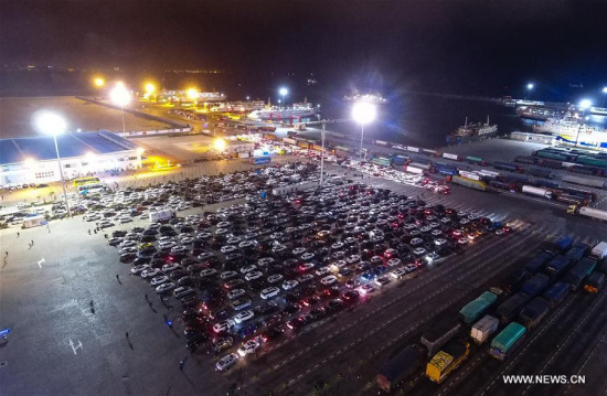 Vehicles wait for ferry service at Xinhaigang port in Haikou, capital of south China's Hainan Province, Feb. 22, 2018. (Xinhua/Yang Guanyu) Vehicles wait for ferry service at Xinhaigang port in Haikou, capital of south China's Hainan Province, Feb. 22, 2018. (Xinhua/Yang Guanyu)