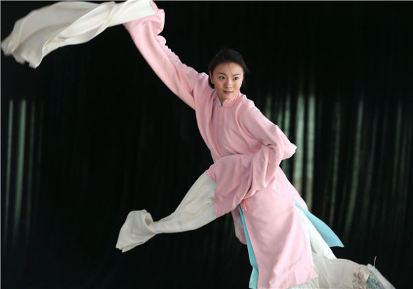 Peking Opera actress Li Li, one of Zhang Huoding's students, rehearses for her upcoming performance in Beijing in May. (Photo by Zou Hong/China Daily) Peking Opera actress Li Li, one of Zhang Huoding's students, rehearses for her upcoming performance in Beijing in May. (Photo by Zou Hong/China Daily)