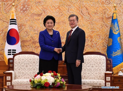 Chinese President Xi Jinping's special envoy Liu Yandong (L) meets with South Korean President Moon Jae-in in Seoul, South Korea, on Feb. 26, 2018. (Xinhua/Ju Huanzong) Chinese President Xi Jinping's special envoy Liu Yandong (L) meets with South Korean President Moon Jae-in in Seoul, South Korea, on Feb. 26, 2018. (Xinhua/Ju Huanzong)