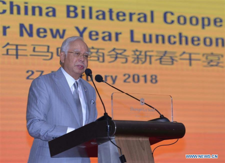 Malaysian Prime Minister Najib Razak speaks during a luncheon in celebration of the Chinese New Year, which was organized by Malaysia-China Business Council, of which he is a patron, on Feb. 27, 2018.(Xinhua) Malaysian Prime Minister Najib Razak speaks during a luncheon in celebration of the Chinese New Year, which was organized by Malaysia-China Business Council, of which he is a patron, on Feb. 27, 2018.(Xinhua)
