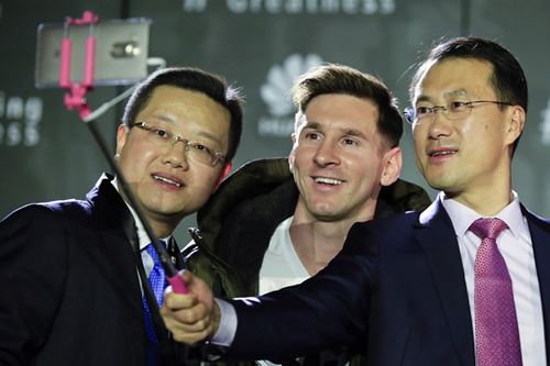 Lionel Messi smiles for the camera during a Huawei product launch in 2016. /China Daily Photo Lionel Messi smiles for the camera during a Huawei product launch in 2016. /China Daily Photo