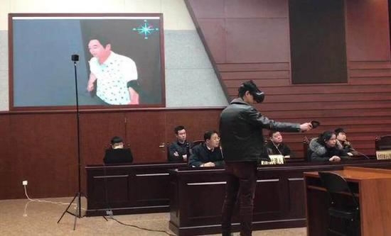 The projection showed the judge and lawyers the crime scene directly. (Photo/CGTN) The projection showed the judge and lawyers the crime scene directly. (Photo/CGTN)
