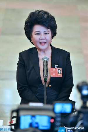 Qiu Yuanping, director of the Overseas Chinese Affairs Office of the State Council of China, receives an interview after the opening meeting of the first session of the 13th CPPCC National Committee at the Great Hall of the People in Beijing, capital of China, March 3, 2018. (Xinhua/Li Xin) Qiu Yuanping, director of the Overseas Chinese Affairs Office of the State Council of China, receives an interview after the opening meeting of the first session of the 13th CPPCC National Committee at the Great Hall of the People in Beijing, capital of China, March 3, 2018. (Xinhua/Li Xin)