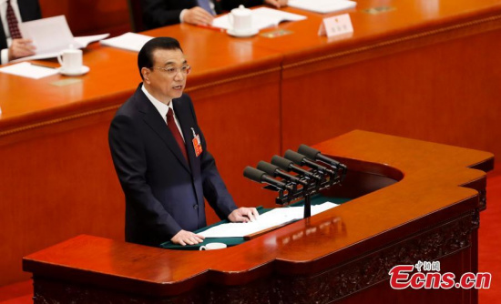 Premier Li Keqiang delivers the government work report at the first session of the 13th National People's Congress at the Great Hall of the People in Beijing, March 5, 2018. (Photo: China News Service/Du Yang) Premier Li Keqiang delivers the government work report at the first session of the 13th National People's Congress at the Great Hall of the People in Beijing, March 5, 2018. (Photo: China News Service/Du Yang)