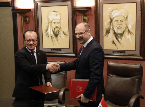 China's Ambassador to Syria Qi Qianjin (L) shakes hands with the head of Assad University Hospital Jaber Ibrahim during the delivery ceremony held in Damascus, Syria, March 7, 2018. (Xinhua/Hummam Sheikh Ali) China's Ambassador to Syria Qi Qianjin (L) shakes hands with the head of Assad University Hospital Jaber Ibrahim during the delivery ceremony held in Damascus, Syria, March 7, 2018. (Xinhua/Hummam Sheikh Ali)