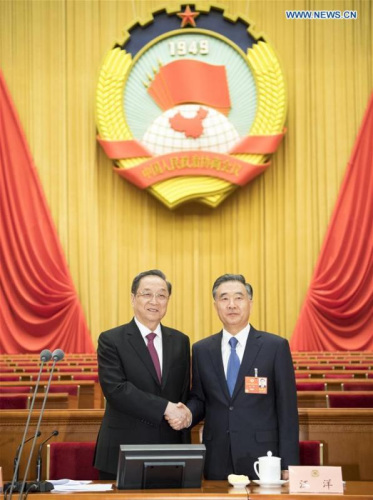 Yu Zhengsheng, chairman of the 12th National Committee of the Chinese People's Political Consultative Conference (CPPCC), shakes hands with Wang Yang, who presides over a presidium meeting of the first session of the 13th CPPCC National Committee, during a preparatory meeting for the first session of the 13th CPPCC National Committee in Beijing, capital of China, March 2, 2018. (Xinhua/Li Xueren) Yu Zhengsheng, chairman of the 12th National Committee of the Chinese People's Political Consultative Conference (CPPCC), shakes hands with Wang Yang, who presides over a presidium meeting of the first session of the 13th CPPCC National Committee, during a preparatory meeting for the first session of the 13th CPPCC National Committee in Beijing, capital of China, March 2, 2018. (Xinhua/Li Xueren)