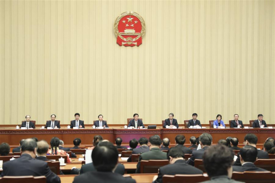 Li Zhanshu, executive chairperson of the presidium of the first session of the 13th National People's Congress (NPC), presides over the 11th meeting of the presidium at the Great Hall of the People in Beijing, capital of China, March 19, 2018. (Xinhua/Xie Huanchi) Li Zhanshu, executive chairperson of the presidium of the first session of the 13th National People's Congress (NPC), presides over the 11th meeting of the presidium at the Great Hall of the People in Beijing, capital of China, March 19, 2018. (Xinhua/Xie Huanchi)