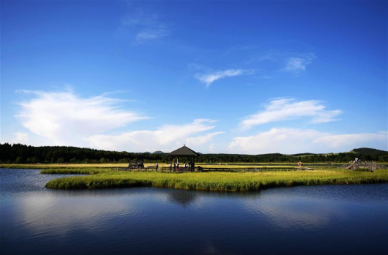Photo taken on July 11, 2017 shows tourists visiting the Qixing Lake Scenic Area of the Saihanba State Forest Park in Weichang Man and Mongolian Autonomous County of Chengde City, north China's Hebei Province. (Xinhua/Wang Xiao) Photo taken on July 11, 2017 shows tourists visiting the Qixing Lake Scenic Area of the Saihanba State Forest Park in Weichang Man and Mongolian Autonomous County of Chengde City, north China's Hebei Province. (Xinhua/Wang Xiao)