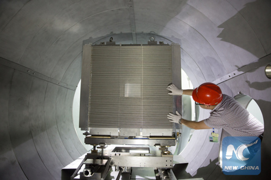 File photo shows engineers debug a neutron instrument for the China Spallation Neutron Source (CSNS) in Dongguan, south China's Guangdong Province, Sept. 1, 2017. A neutron beam was successfully obtained at the CSNS for the first time on Aug. 28, 2017.