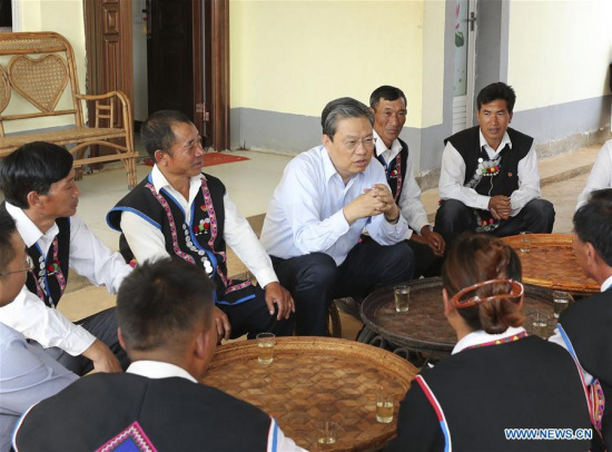 Zhao Leji, member of the Standing Committee of the Political Bureau of the Central Committee of the Communist Party of China (CPC) and secretary of the CPC Central Commission for Discipline Inspection (CCDI), visits the home of villagers in Sanmai Village of Menghai County, southwest China's Yunnan Province, March 25, 2018. (Xinhua/Ding Lin)