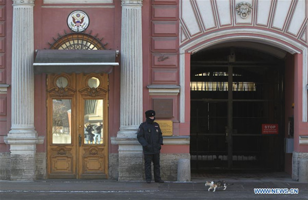 A police officer stands guard at the U.S. consulate general in St. Petersburg, Russia, March 30, 2018. Russia will expel 60 U.S. diplomats and shut the U.S. consulate general in St. Petersburg in tit-for-tat retaliation for Washington's moves against Moscow over an ex-spy incident, the Russian Foreign Ministry said Thursday. (Xinhua/Lu Jinbo) A police officer stands guard at the U.S. consulate general in St. Petersburg, Russia, March 30, 2018. Russia will expel 60 U.S. diplomats and shut the U.S. consulate general in St. Petersburg in tit-for-tat retaliation for Washington's moves against Moscow over an ex-spy incident, the Russian Foreign Ministry said Thursday. (Xinhua/Lu Jinbo)