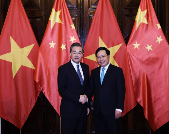 Visiting Chinese State Councilor and Foreign Minister Wang Yi (L) shakes hands with Vietnamese Deputy Prime Minister and Foreign Minister Pham Binh Minh before their talks in Hanoi, Vietnam, April 1, 2018. (Xinhua/Wang Shen) Visiting Chinese State Councilor and Foreign Minister Wang Yi (L) shakes hands with Vietnamese Deputy Prime Minister and Foreign Minister Pham Binh Minh before their talks in Hanoi, Vietnam, April 1, 2018. (Xinhua/Wang Shen)