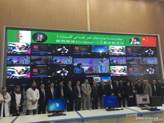Representatives from China and Algeria pose for photos during an on-orbit delivery ceremony for Algeria's first communication satellite, Alcomsat-1, in Algiers, Algeria, April 1, 2018. China said Monday that it expects to boost its cooperation with Algeria in the field of aerospace technology. (Xinhua)