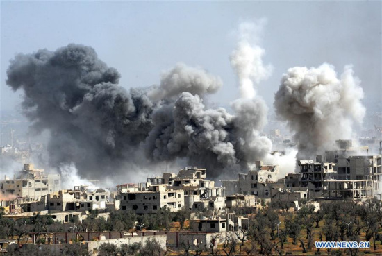 Smoke rises after the Syrian army's shelling targeted the Douma district in Eastern Ghouta countryside of Damascus, Syria, on April 7, 2018. (Xinhua/Ammar Safarjalani)