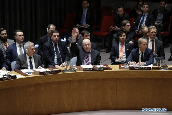 Russian Ambassador to the United Nations Vassily Nebenzia (C, Front) vetos a U.S.-drafted resolution on probe of chemical weapons use in Syria at the UN headquarters in New York, April 10, 2018. Russia vetoed a U.S.-drafted Security Council resolution on probe of chemical weapons use in Syria on Tuesday. (Xinhua/Li Muzi) Russian Ambassador to the United Nations Vassily Nebenzia (C, Front) vetos a U.S.-drafted resolution on probe of chemical weapons use in Syria at the UN headquarters in New York, April 10, 2018. Russia vetoed a U.S.-drafted Security Council resolution on probe of chemical weapons use in Syria on Tuesday. (Xinhua/Li Muzi)