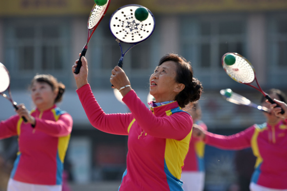 Retirees and homemakers practise taichi at a playground in Chaohu, Anhui province. (Photo by Li Yuanbo/For China Daily) Retirees and homemakers practise taichi at a playground in Chaohu, Anhui province. (Photo by Li Yuanbo/For China Daily)