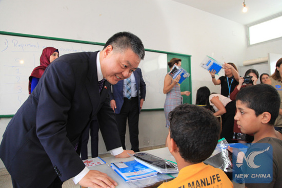 In this file photo, Chinese Ambassador to Lebanon Wang Kejian delivered school supplies to Syrian refugee students in a school in Beirut, Lebanon on Oct. 23, 2017. China donated 1 million U.S. dollars to the UNICEF for providing school aid to Syrian refugee students in Lebanon. (Xinhua/Li Liangyong) In this file photo, Chinese Ambassador to Lebanon Wang Kejian delivered school supplies to Syrian refugee students in a school in Beirut, Lebanon on Oct. 23, 2017. China donated 1 million U.S. dollars to the UNICEF for providing school aid to Syrian refugee students in Lebanon. (Xinhua/Li Liangyong)