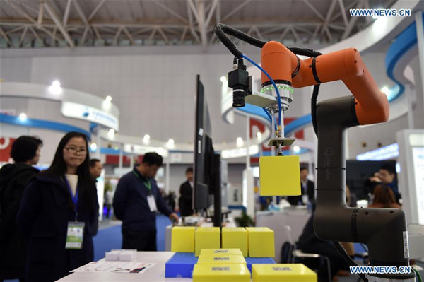 Photo taken on April 13, 2018 shows an exhibit of a robot firm during the 2018 China (Tianjin) International Fair for Investment and Trade & Pacific Economic Cooperation Council (PECC) Exposition in Tianjin, north China, 2018. The expo kicked off Friday here in Tianjin. (Xinhua/Li Ran) Photo taken on April 13, 2018 shows an exhibit of a robot firm during the 2018 China (Tianjin) International Fair for Investment and Trade & Pacific Economic Cooperation Council (PECC) Exposition in Tianjin, north China, 2018. The expo kicked off Friday here in Tianjin. (Xinhua/Li Ran)