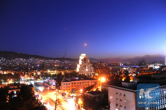 Surface-to-air missiles were seen in the sky over Syria's capital Damascus on April 14, 2018, as the Syrian air defenses were responding to the U.S.-led missile attack on Syria. (Xinhua/Ammar Safarjalani) Surface-to-air missiles were seen in the sky over Syria's capital Damascus on April 14, 2018, as the Syrian air defenses were responding to the U.S.-led missile attack on Syria. (Xinhua/Ammar Safarjalani)