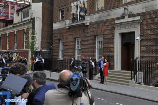 Prince William (2nd R, Rear), Duke of Cambridge, and his wife Catherine (1st R, Rear), Duchess of Cambridge, present their newborn son outside St. Mary's Hospital in London, Britain, on April 23, 2018. Catherine on Monday gave birth to a boy, her third child, who is the fifth in line to the British throne. (Xinhua/Stephen Chung) Prince William (2nd R, Rear), Duke of Cambridge, and his wife Catherine (1st R, Rear), Duchess of Cambridge, present their newborn son outside St. Mary's Hospital in London, Britain, on April 23, 2018. Catherine on Monday gave birth to a boy, her third child, who is the fifth in line to the British throne. (Xinhua/Stephen Chung)