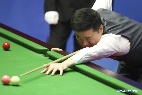 Ding Junhui of China competes during the first round match against Xiao Guodong of China at the World Snooker Championship 2018 at the Crucible Theatre in Sheffield, Britain, on April 23, 2018. (Xinhua/Han Yan) Ding Junhui of China competes during the first round match against Xiao Guodong of China at the World Snooker Championship 2018 at the Crucible Theatre in Sheffield, Britain, on April 23, 2018. (Xinhua/Han Yan)