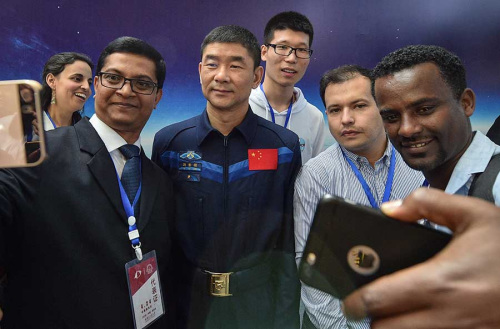 Astronaut Liu Boming attends the China Space Day celebration at the Harbin Institute of Technology on Tuesday in Harbin. Liu flew aboard the Shenzhou VII in 2008. (Su Dong/For China Daily)