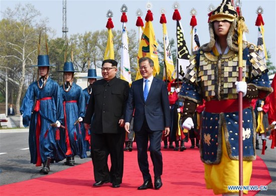 South Korean President Moon Jae-in (R) meets with top leader of the Democratic People's Republic of Korea (DPRK) Kim Jong Un in the border village of Panmunjom on April 27, 2018. Moon Jae-in arrived Friday morning in the border village of Panmunjom for his first summit with Kim Jong Un. (Xinhua/Inter-Korean Summit Press Corps) South Korean President Moon Jae-in (R) meets with top leader of the Democratic People's Republic of Korea (DPRK) Kim Jong Un in the border village of Panmunjom on April 27, 2018. Moon Jae-in arrived Friday morning in the border village of Panmunjom for his first summit with Kim Jong Un. (Xinhua/Inter-Korean Summit Press Corps)