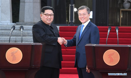 South Korean President Moon Jae-in (R) and Kim Jong Un, top leader of the Democratic People's Republic of Korea (DPRK) shake hands during a press conference at the border village of Panmunjom, on April 27, 2018. (Xinhua/Inter-Korean Summit Press Corps) 
