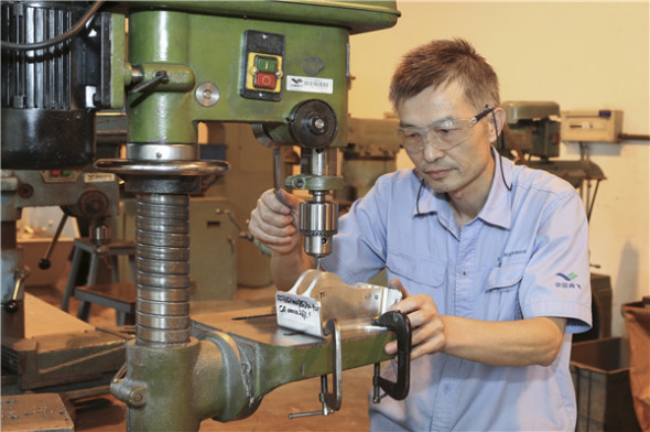 Hu Shuangqian at work.(Photo provided to China Daily) Hu Shuangqian at work.(Photo provided to China Daily)