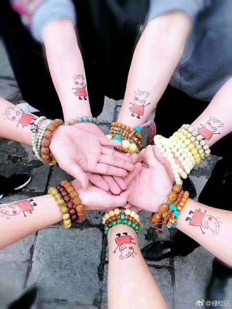 Peppa mania has led to adults showing off their Peppa Pig merchandise and tattoos on social media platforms. (Photo provided to China Daily) Peppa mania has led to adults showing off their Peppa Pig merchandise and tattoos on social media platforms. (Photo provided to China Daily)