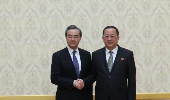 Visiting Chinese State Councilor and Foreign Minister Wang Yi (L) shakes hands with Ri Yong Ho, foreign minister of the Democratic People's Republic of Korea (DPRK), during their talks in Pyongyang, the DPRK, May 2, 2018. (Xinhua) Visiting Chinese State Councilor and Foreign Minister Wang Yi (L) shakes hands with Ri Yong Ho, foreign minister of the Democratic People's Republic of Korea (DPRK), during their talks in Pyongyang, the DPRK, May 2, 2018. (Xinhua)
