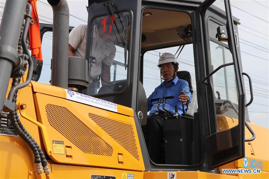 Cambodia broadens national road with Chinese aid
