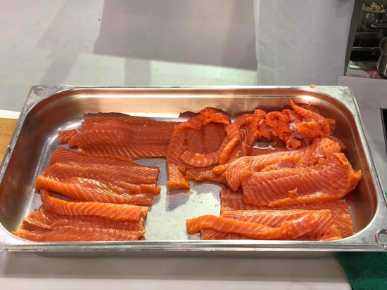 Atlantic salmon awaiting seasoning and cooking. /CGTN Photo Atlantic salmon awaiting seasoning and cooking. /CGTN Photo