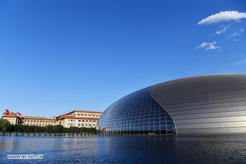 The National Center for the Performing Arts and the Great Hall of the People under a blue sky in 2017. (Photo/Xinhua)