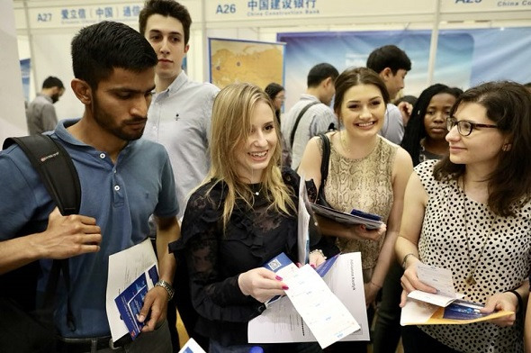 International students search for jobs at the Fifth Career Fair for International Students in China at Peking University, Beijing, on May 12, 2018. (Photo by Zhu Xingxin/China Daily) International students search for jobs at the Fifth Career Fair for International Students in China at Peking University, Beijing, on May 12, 2018. (Photo by Zhu Xingxin/China Daily)