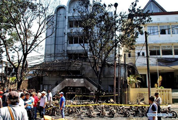 People gather at a bombing site in Surabaya, capital of Indonesia's East Java Province, May 13, 2018. (Xinhua/Kurniawan)