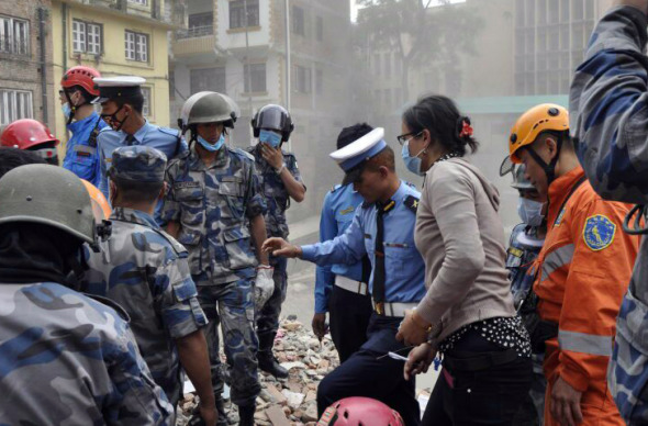 Members of the Clouded Leopard Rescue Team at work during the relief efforts after the Nepal earthquake in April 2015. (Photo for China Daily/Tang Huaming) Members of the Clouded Leopard Rescue Team at work during the relief efforts after the Nepal earthquake in April 2015. (Photo for China Daily/Tang Huaming)