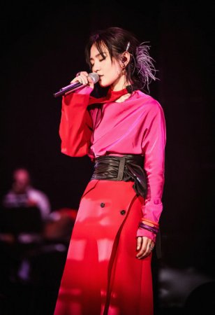 Zhou Bichang says that while the way of consuming music has changed today with more people listening to music online rather than buying physical records, she still likes CDs. (Photo provided to China Daily)