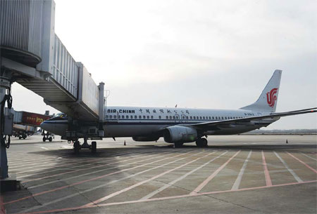 An Air China plane at an airport in Zhengzhou, Henan province. As the EU's carbon tax scheme arouses opposition from a number of countries, there are signs the trading bloc could soften its stance. [Photo / China Daily]