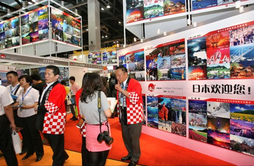 Travel promoters at Japan's booth at the 2011 Beijing International Tourism Expo. The number of tourists traveling between the two countries has dropped significantly amid safety concerns and strained bilateral relations. [Photo/China Daily]