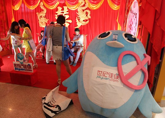Jiayuan.com's booth at an international Internet exposition in Beijing. The online dating website went public on the Nasdaq in 2011. Provided to China Daily
